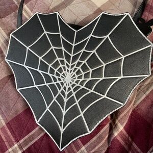 Mad engine crossbody spider web bag